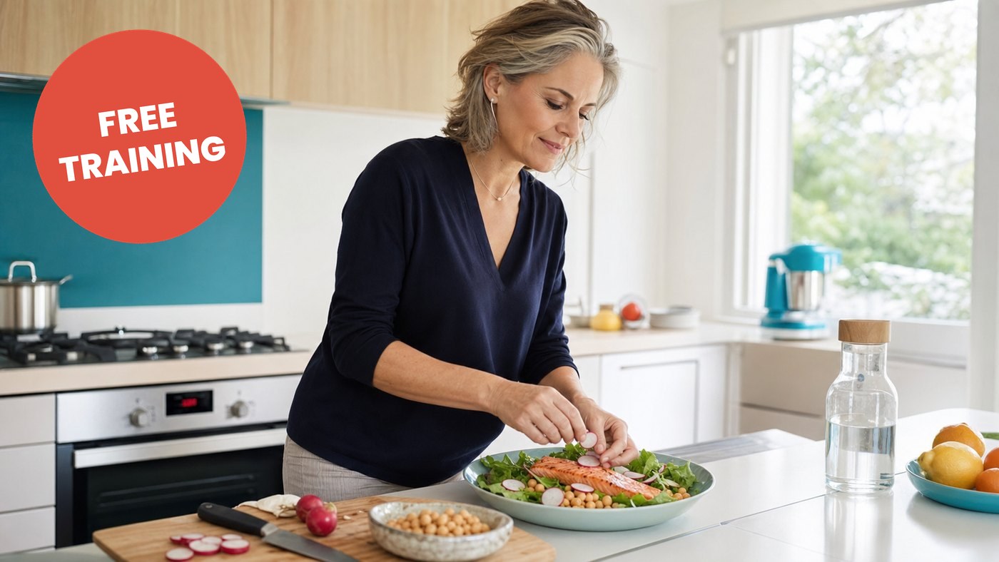 A woman in a bright kitchen finishing a salad with salmon and chickpeas